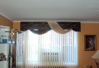 Cornice with attached swags over Fabric Verticals